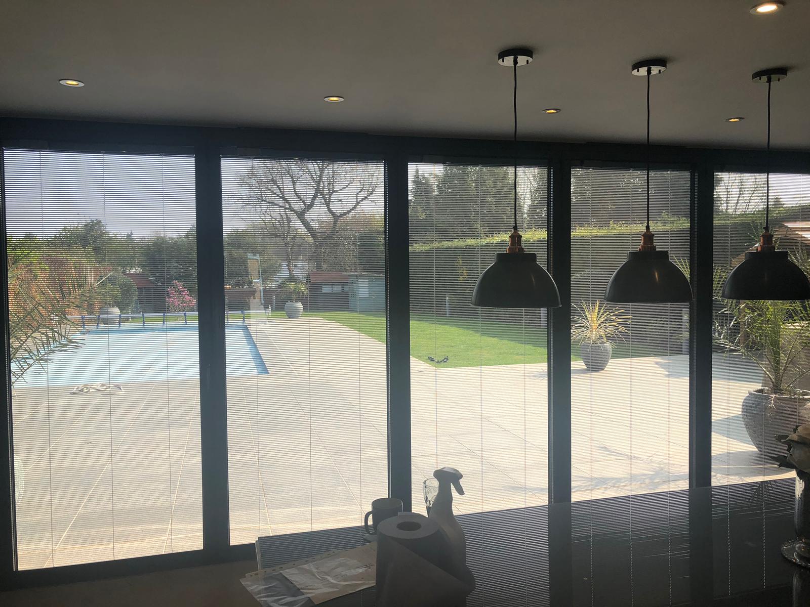 Integral blinds in bifolds interior.jpg