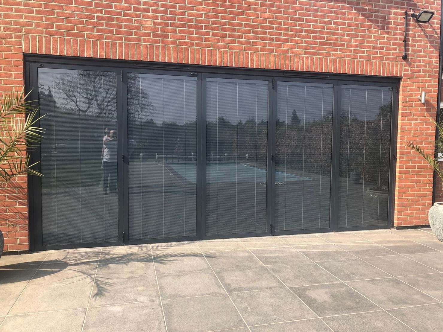 Bifold doors with integral blinds in Esher, Surrey